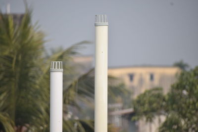 Close-up of metal structure against sky