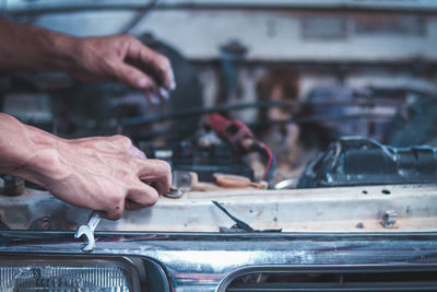 Man working in car