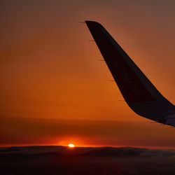 View of airplane at sunset
