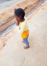 High angle view of boy on beach