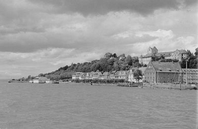 View of city against cloudy sky