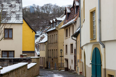 Cobbled alley with half-timbered houses in the city meisenheim, germany in winter