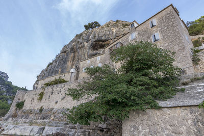 Low angle view of historic building against sky