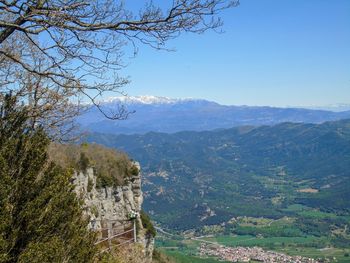 Scenic view of mountains against clear blue sky