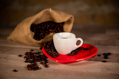 Close-up of coffee cup on table