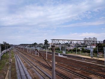 Train on railroad tracks against sky
