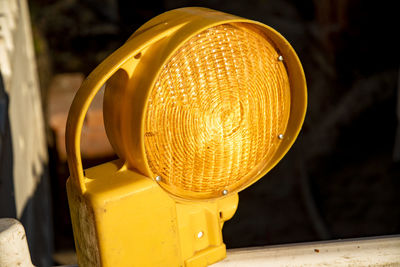 Close-up of illuminated light bulb