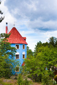 Red building against sky