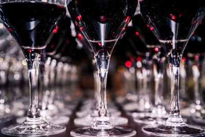 Close-up of wine glasses on table