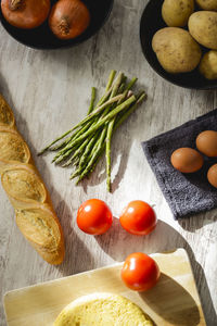 High angle view of fruits on cutting board