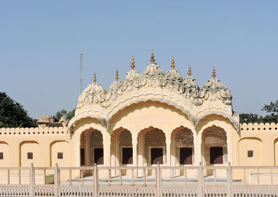 Exterior of historic building against clear sky