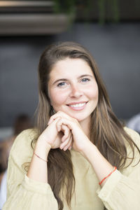 Portrait of a smiling young woman