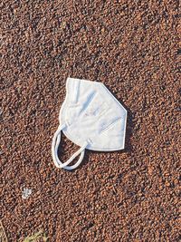 High angle view of shoe on sand