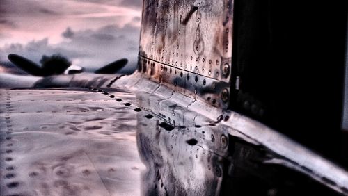 Close-up of car against sky