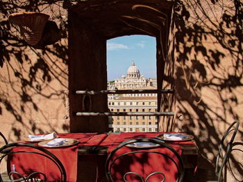 Reflection of building on table