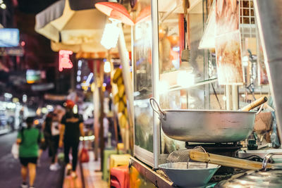 Interior of illuminated restaurant at night