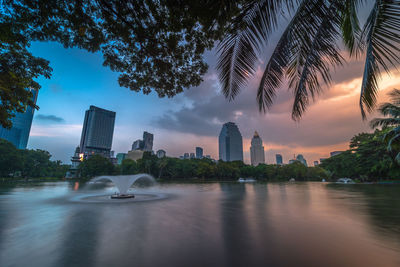 City skyline against cloudy sky