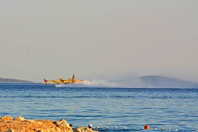 Scenic view of sea against clear sky