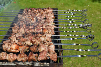 Close-up of meat on barbecue grill