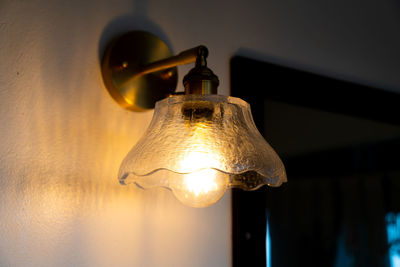 Close-up of illuminated light bulb