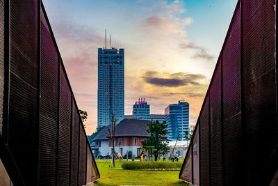 Panoramic view of buildings against sky during sunset