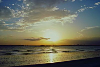 Scenic view of sea at sunset