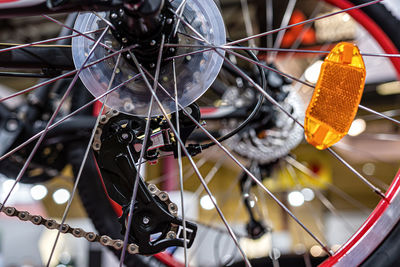 Close-up of bicycle hanging on metal