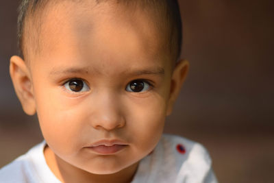 Close-up portrait of cute boy
