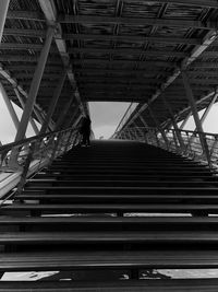 Low angle view of bridge in city