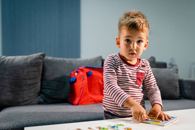 Boy playing at home