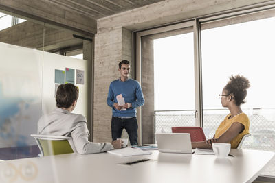 Businessman leading a presentation in office