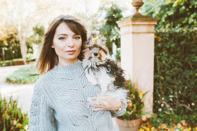 Portrait of woman with dog