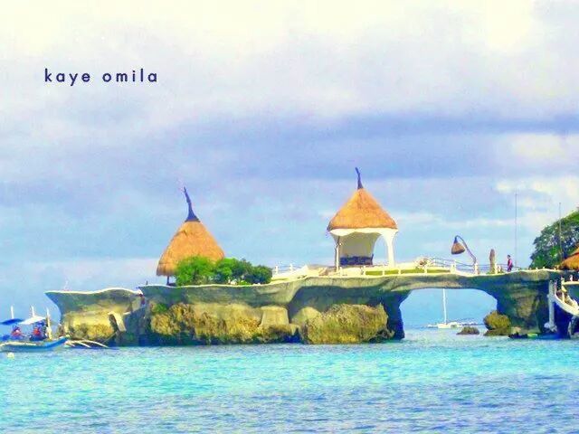 water, sky, waterfront, architecture, building exterior, built structure, cloud - sky, sea, nautical vessel, cloud, cloudy, religion, transportation, day, place of worship, guidance, outdoors, mode of transport, boat, nature