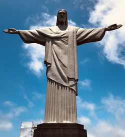 Low angle view of statue against sky