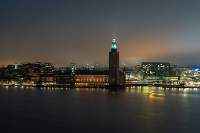 Illuminated buildings in city at night