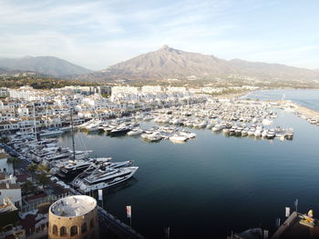 High angle view of sailboats in city