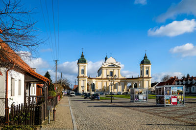 View of street and buildings against sky