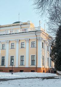 Building against sky during winter