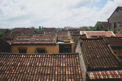 Exterior of old building in town against sky