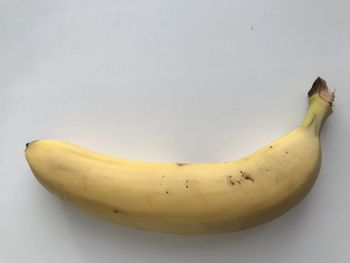 Close-up of bananas against white background