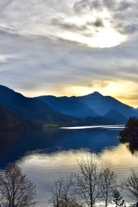 Scenic view of lake against sky during sunset