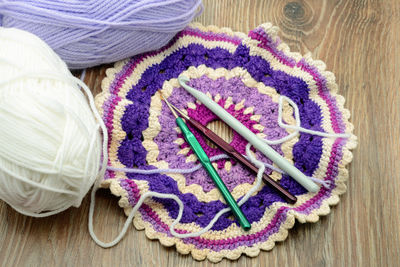 High angle view of colorful crochets on table