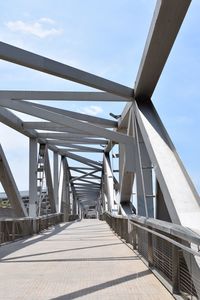 View of footbridge against sky