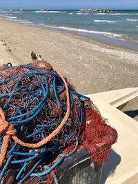 High angle view of fishing net on beach