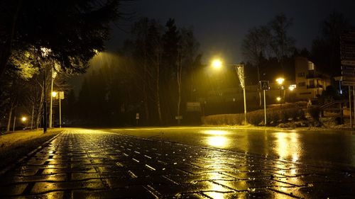 Illuminated street lights at night