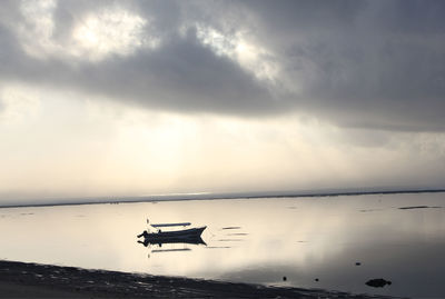 Ship in sea against sky