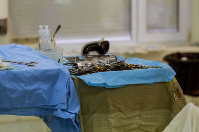 Close-up of medical equipment on table at hospital