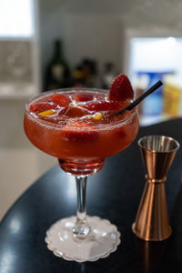 Close-up of wineglass on table