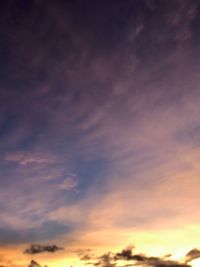Low angle view of dramatic sky during sunset