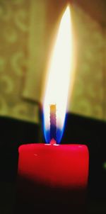 Close-up of burning candle